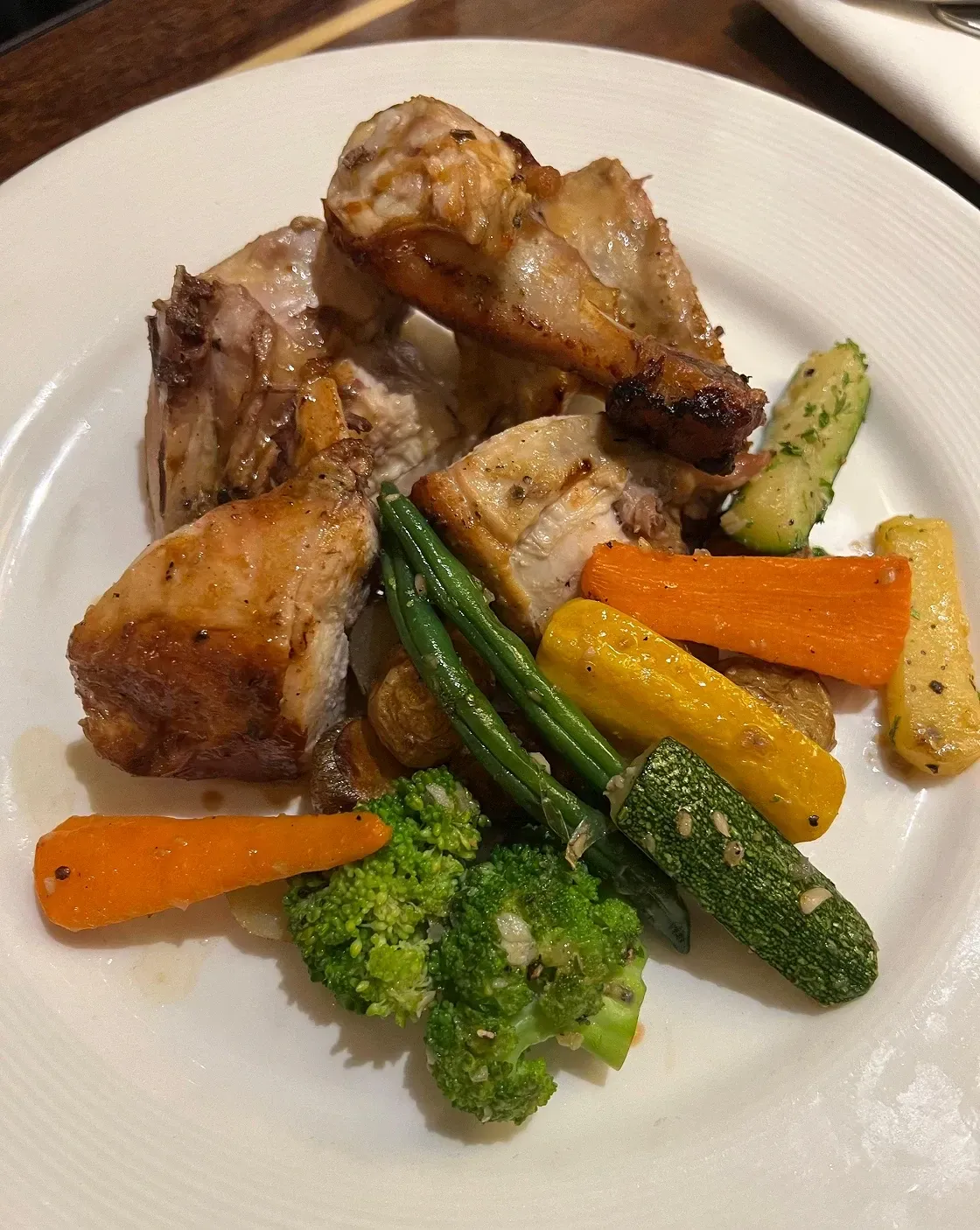 Roast chicken with grilled carrots, beans and broccoli