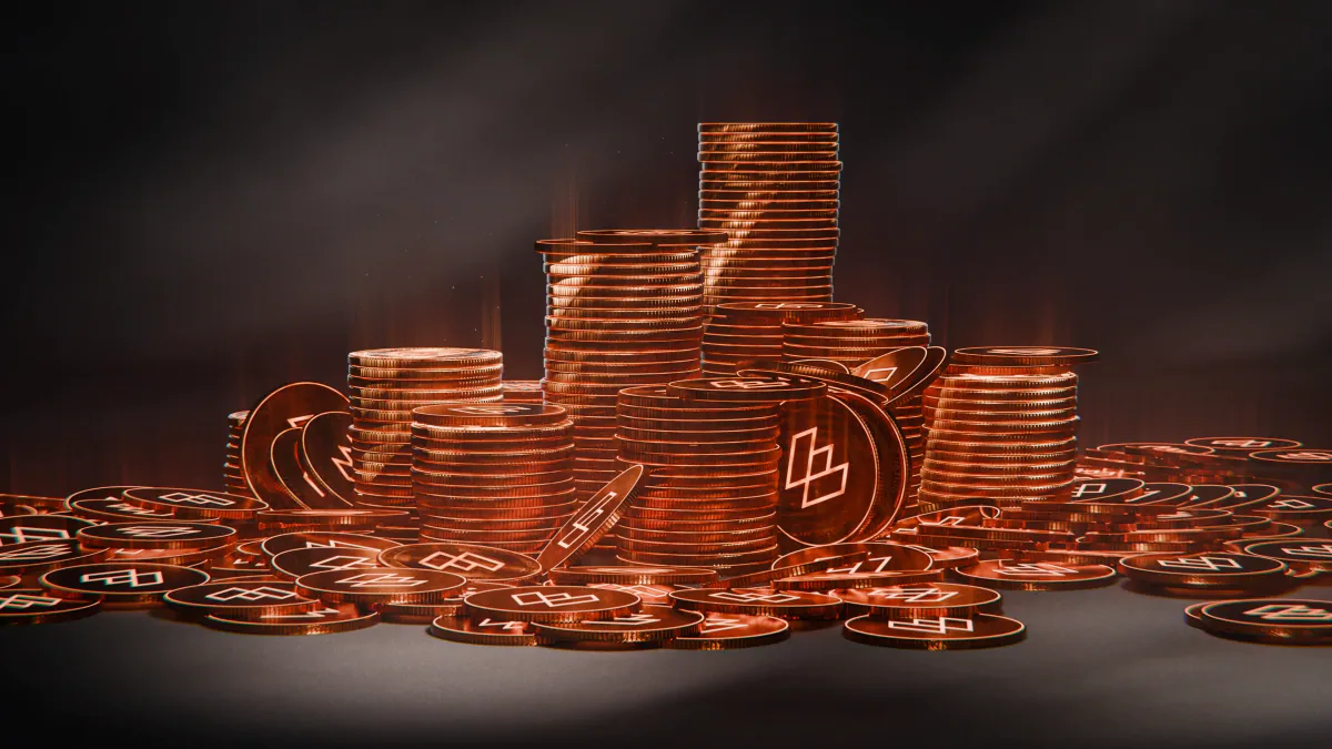Stacks of copper $WILD coins on a dark smoky surface