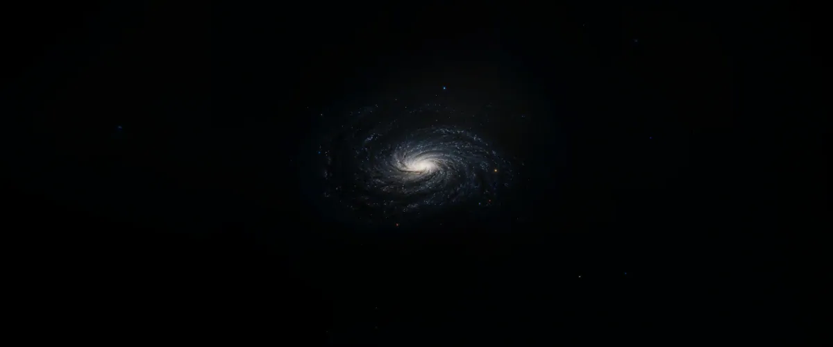 Spiral galaxy glowing in dark space