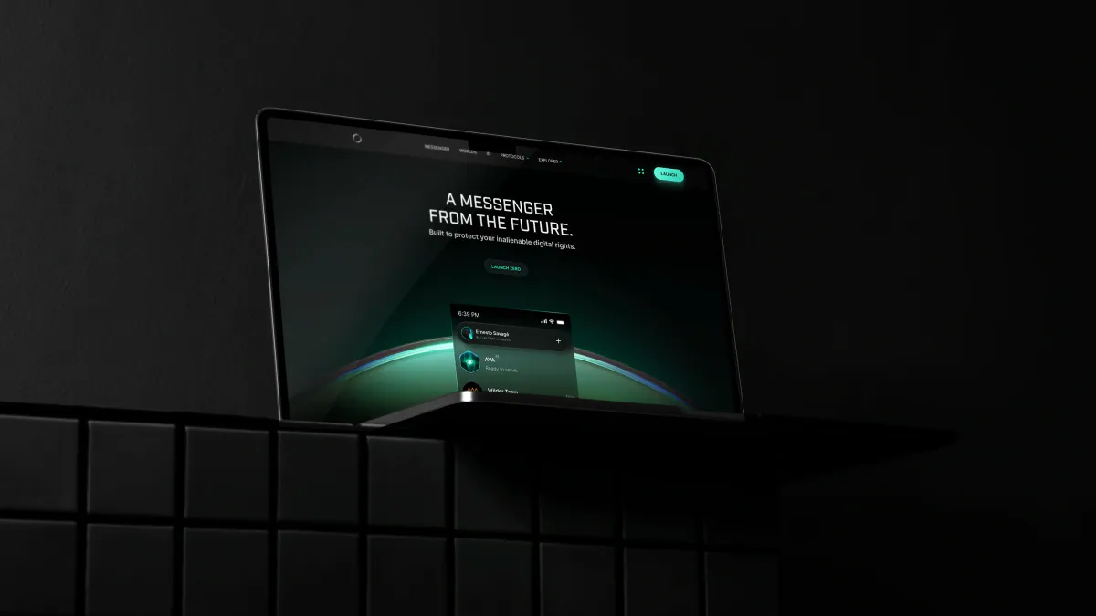 Laptop on a dark shelf showing the ZERO messenger website